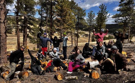 New Vista high school CAP students taking a break during their fire mitigation project at Cal-wood