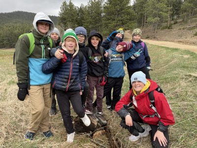 Angevine Middle School students posing as a group on their day trip