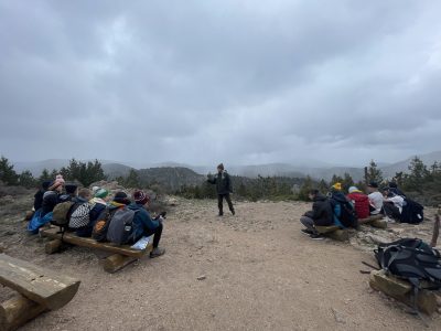 Angevine Middle School students learning as a group outside on their day trip