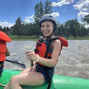 A RiseUp Community High School student rafting on the Arkansas River during the Watershed Project trip