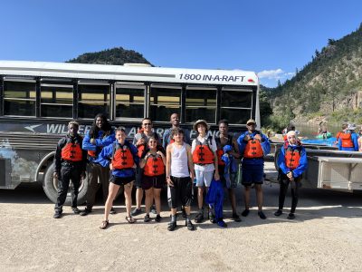 The Lincoln Hills Cares Watershed Program group poses in their lifejackets, ready for rafting