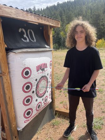 Ryder C. gets a bullseye on CHS Field Day