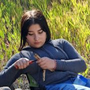 An AXL student whittling