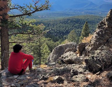 A CHS student reflects while taking in a beautiful view of the valley