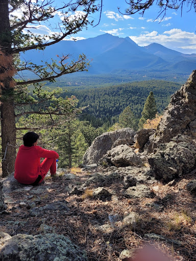 A CHS student reflects while taking in a beautiful view of the valley